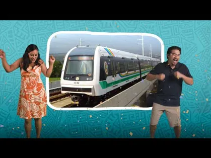 Two people dancing in front of the transit